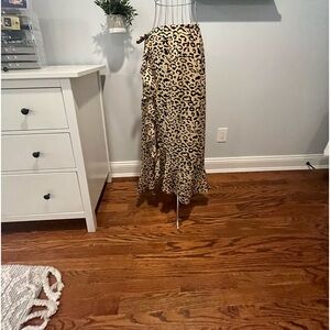 Leopard print ruffle zipped full length skirt/cover up.  Size L